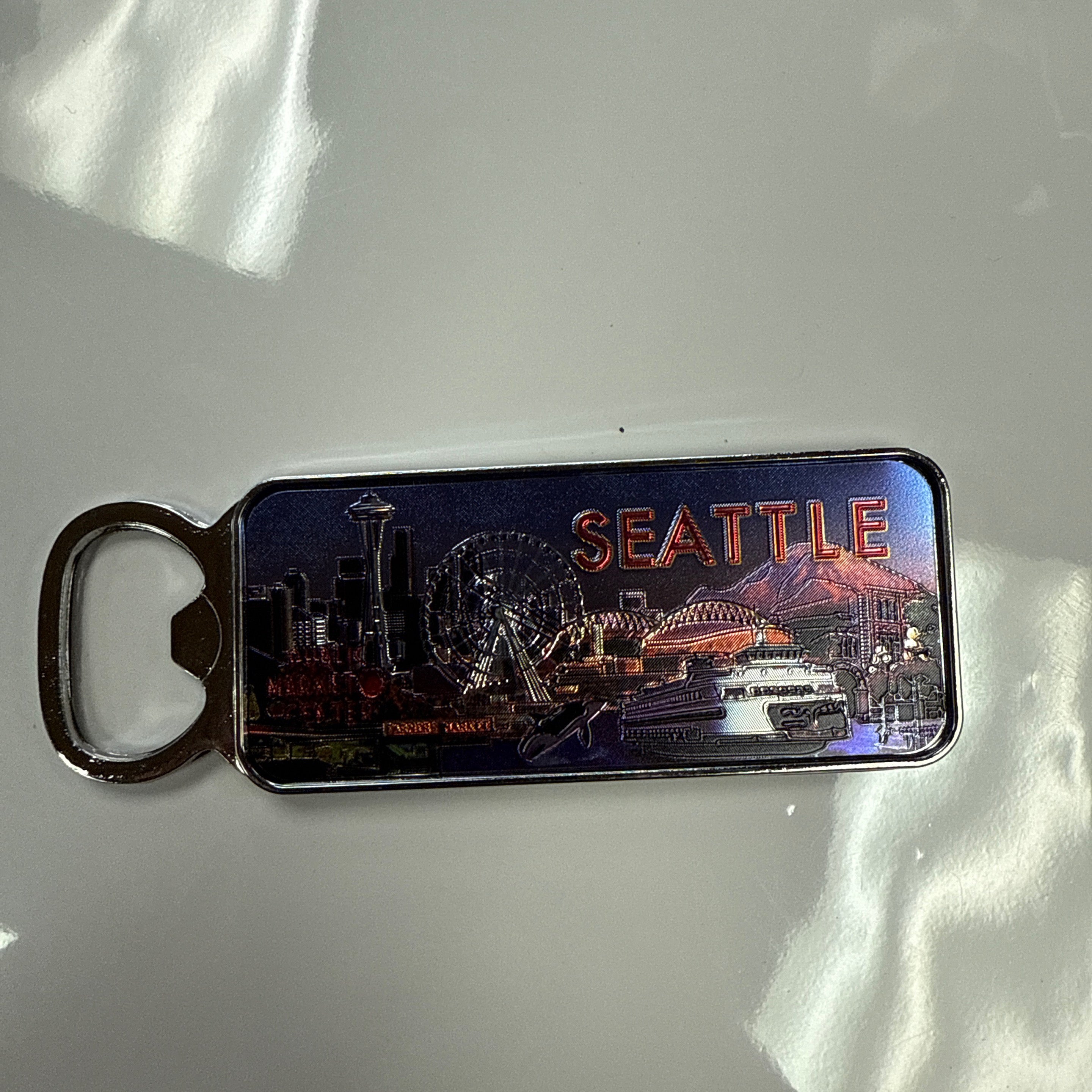 22122 Sea Collage Nickel Opener