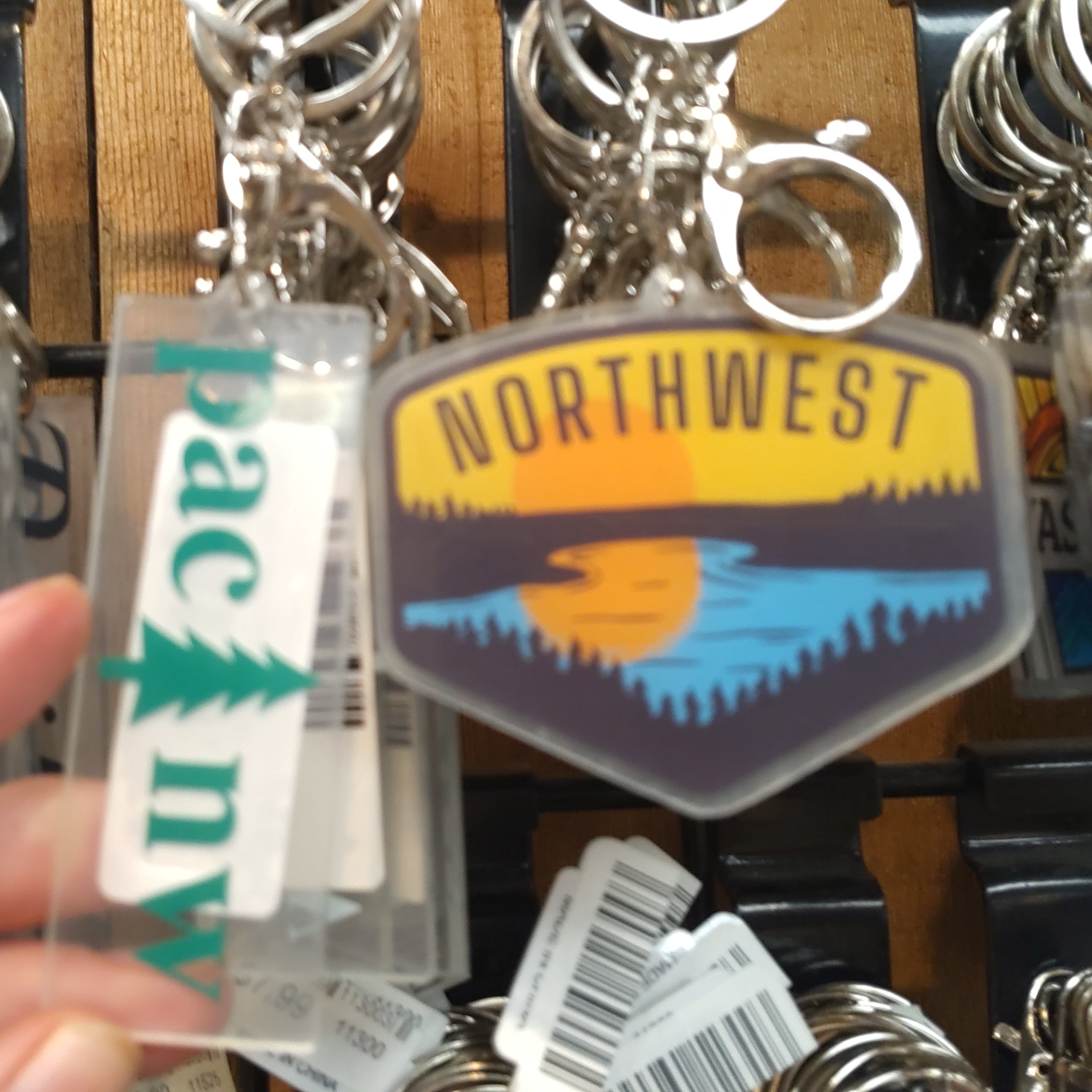 assort of acrylic keychain by Direction Apparel
